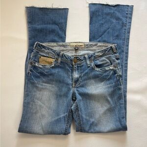 J & Company Low Rise Medium Wash Distressed Suede Pockets raw hem Jeans. 28